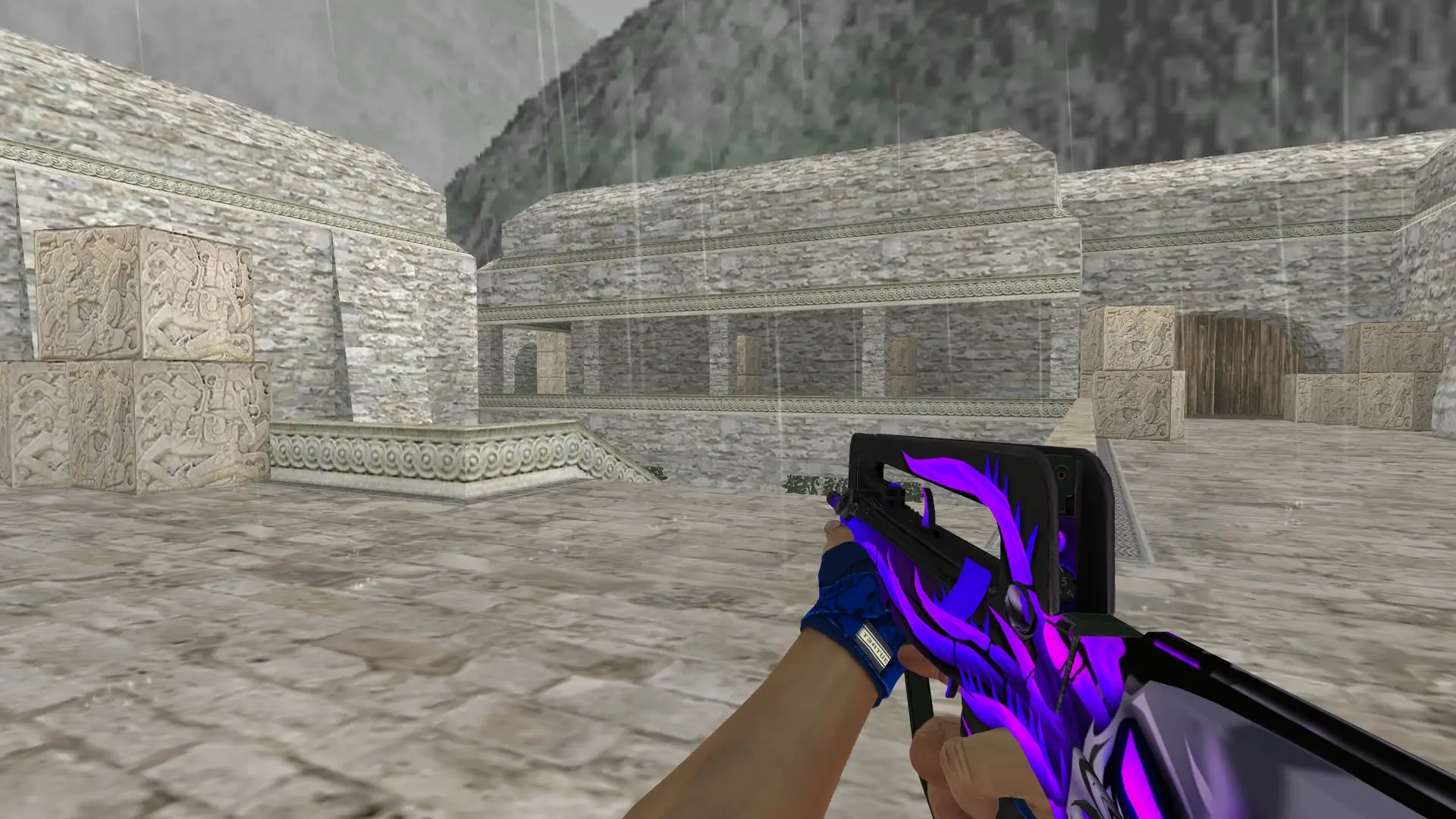 FAMAS: Hand Wraps Cobalt Skulls Pack — de_aztec (first person)