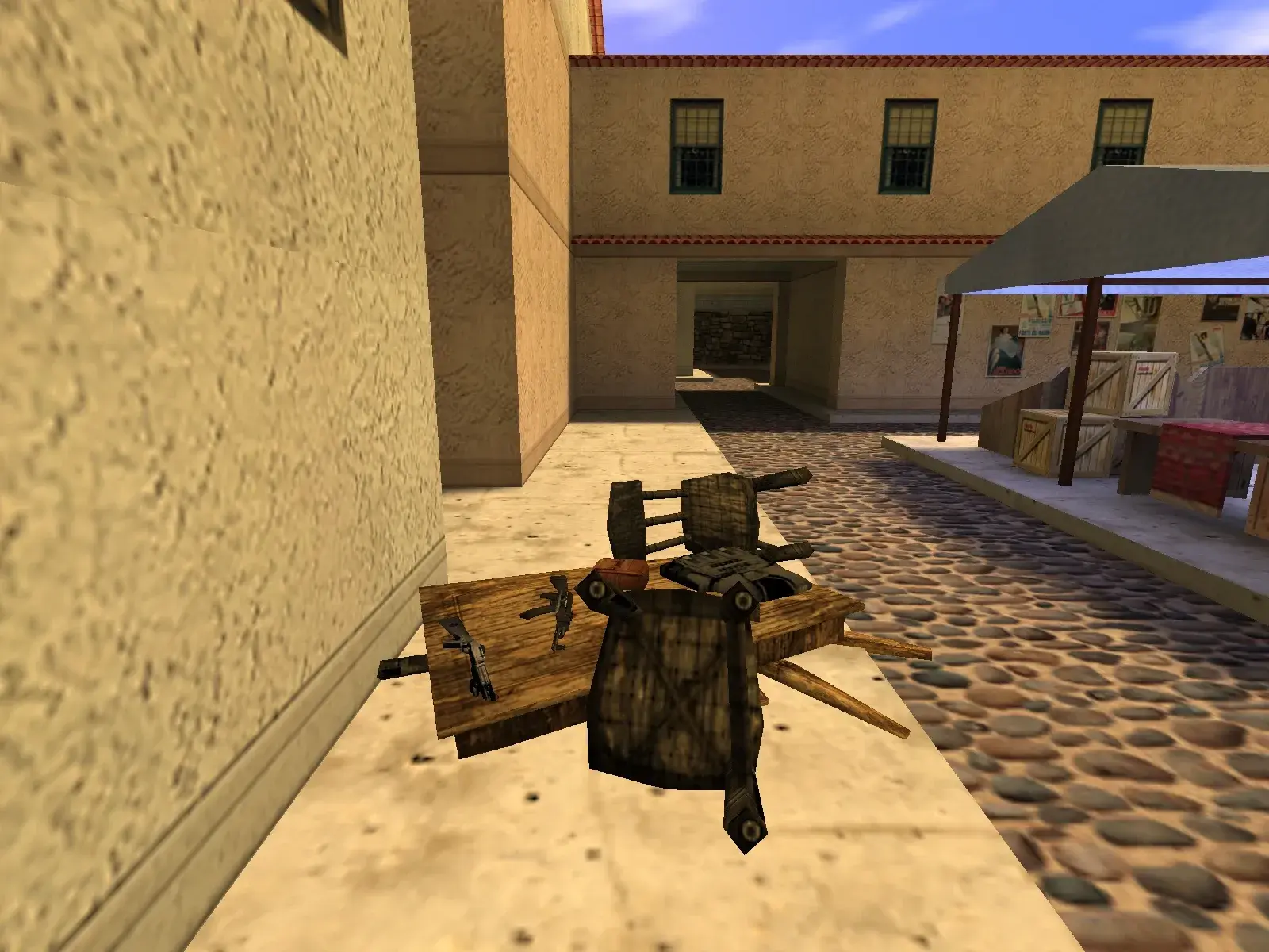 Table with Weapons and Gear — cs_italy, the market street